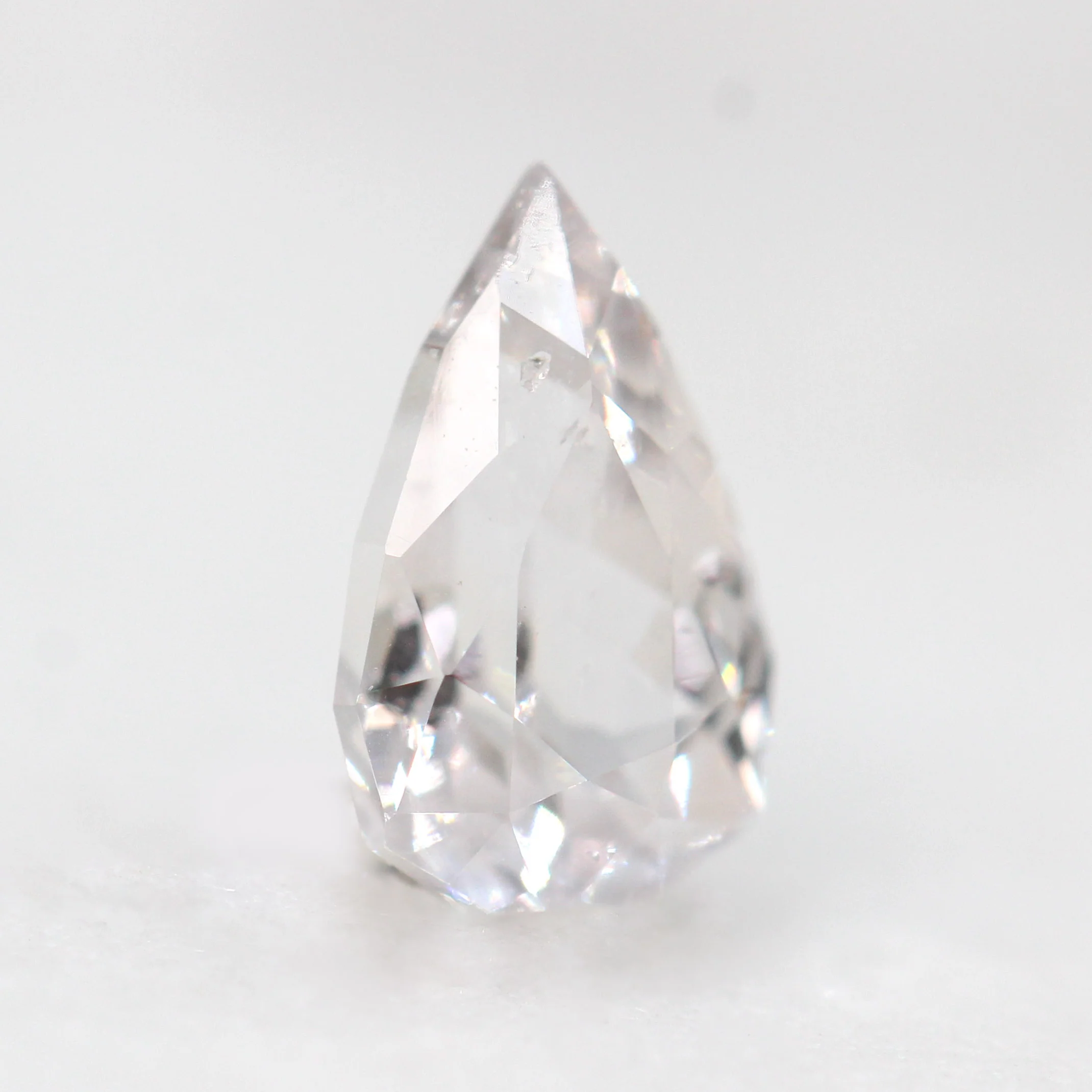 0.81 Carat Clear Geometric Pear Sapphire for Custom Work - Inventory Code CPS081 - Image 4