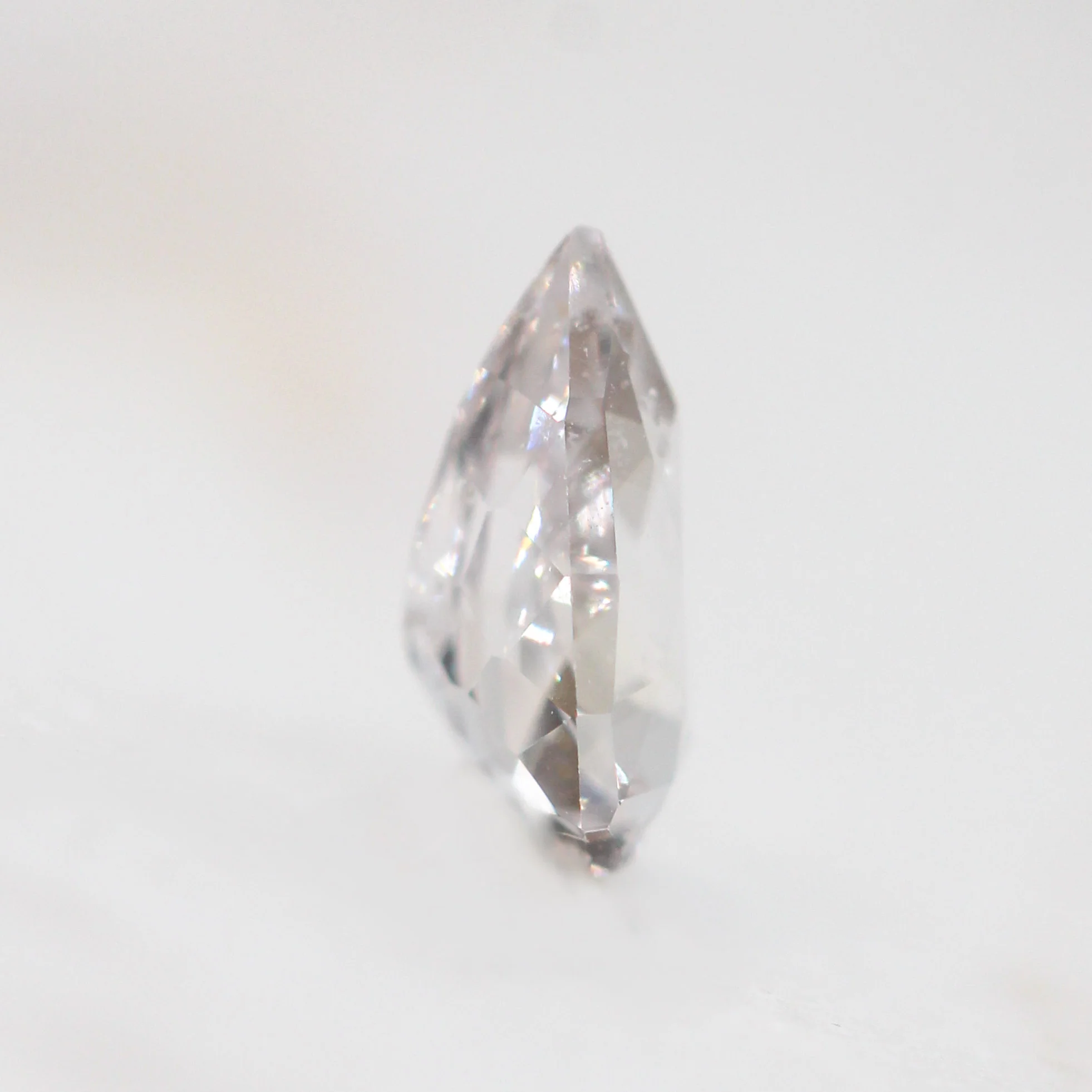 0.81 Carat Clear Geometric Pear Sapphire for Custom Work - Inventory Code CPS081 - Image 5